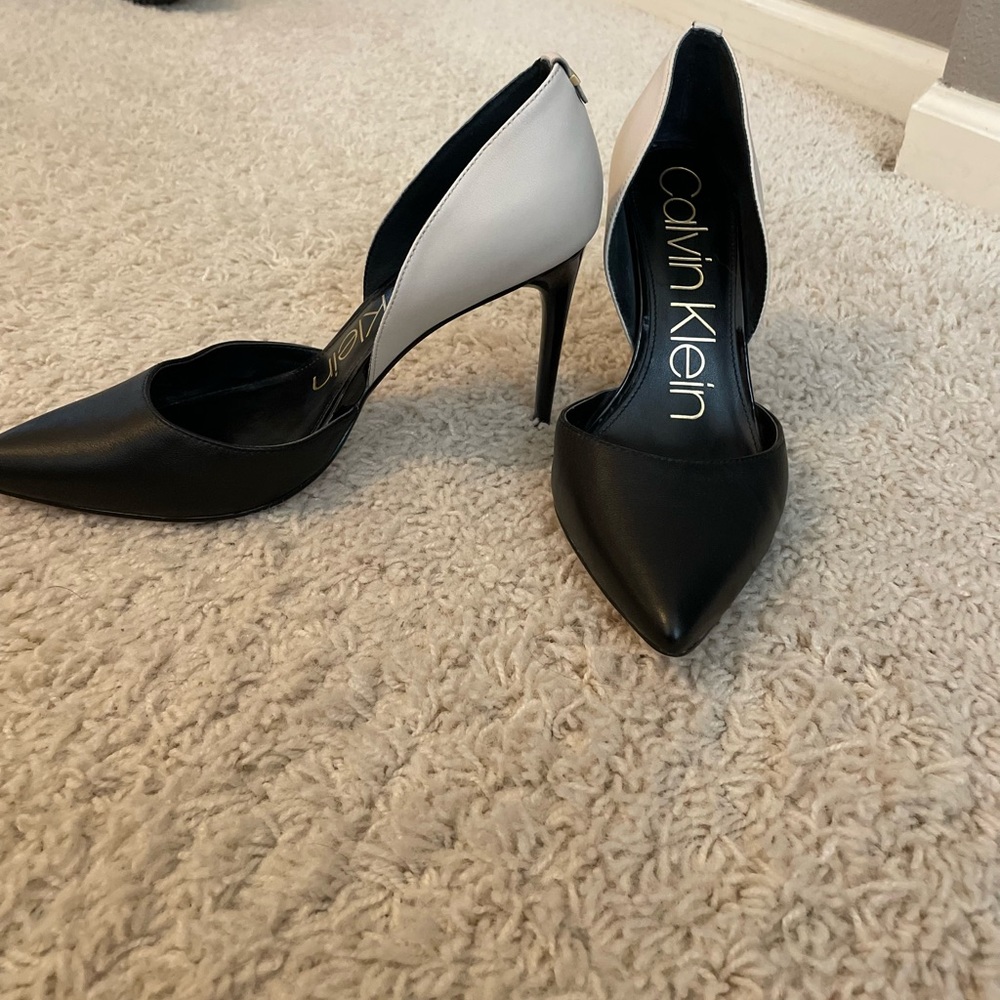 Black and white Calvin Klein pumps